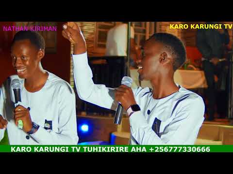 Nathan kiriman perfomiming museveni kiriman on stage