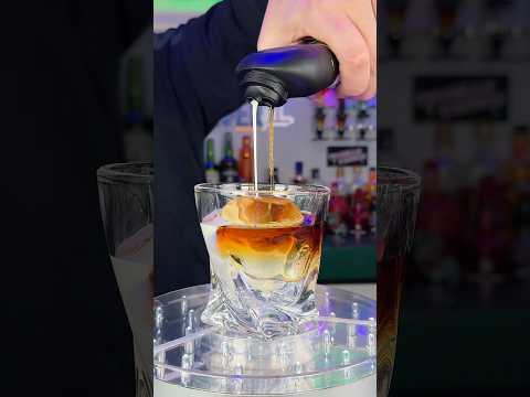 Sheridans Irish coffee layered cream poured over ice #sheridans #icepress #mancavebartender