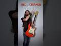 Is that Donner DST-600 Electric Guitar RED or ORANGE?