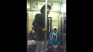 Stranger Stands Up For a Female Passenger Being Bullied by Her Boyfriend on The NY Subway