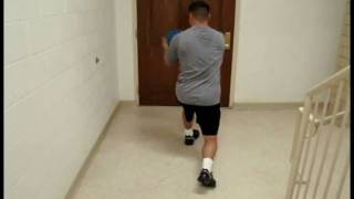 Medicine ball wall toss left with left foot forward