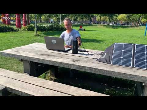 Charge  your laptop with an universal laptop powerbank and the sun