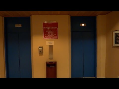 Modernized Glass Otis Traction Elevators at the Wyndham Parking Garage in San Antonio TX