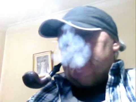 Smoker, of Peterson' s Dublin, Sterling, Silver, Pipe Tobaccos, with Scotland Shirt; and " Lara "