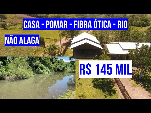 CHACRINHA DE FRENTE PARA O RIO COM CASA, FIBRA ÓTICA, POMAR E ÁGUA ENCANADA NO CARAÁ   R$ 155 MIL