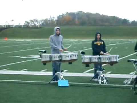The Adrian College Drumline playing 