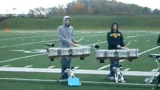 The Adrian College Drumline playing 