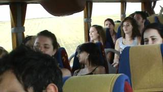 WYD 2011: Naz leads a sing song on the coach