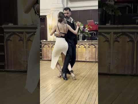 Andrés Molina  and  Natacha Lockwood  are  dancing  to  a  milonga