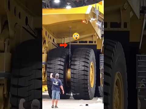 Why Do Mining Trucks Drag a Giant Chain Behind Them?