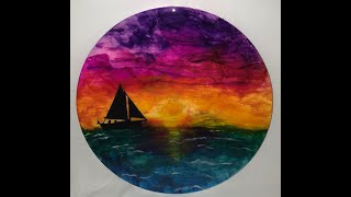Alcohol Inks and Resin Sunset - The Finale - Adding Vinyl Sailboat Silhouette