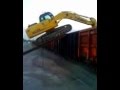 Excavator climbing railcar