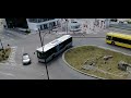 Isuzu Citiport și Maz 107 întorcând La Poarta 1
