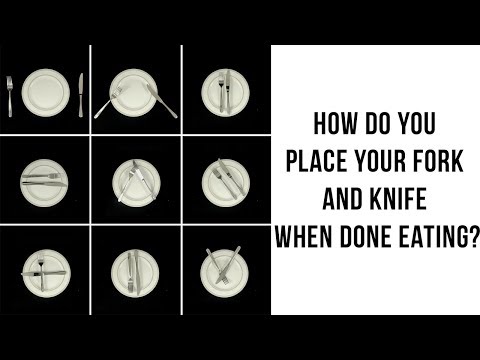 image-How should you place your knife and fork when finished eating?
