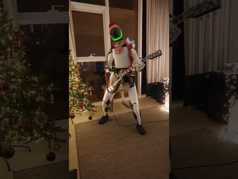 Robô Humanoide Tocando Guitarra
