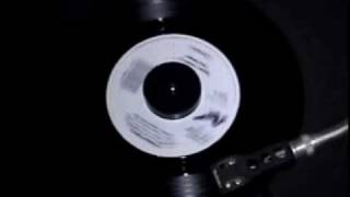 Huey Lewis & The News - 01 Perfect World (Polystyrene 45 R.P.M.)