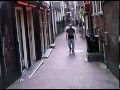 Prostitutes in Red Light District # Amsterdam street preacher