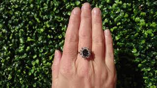 Download the video "An 18 carat white gold sapphire and diamond ring"