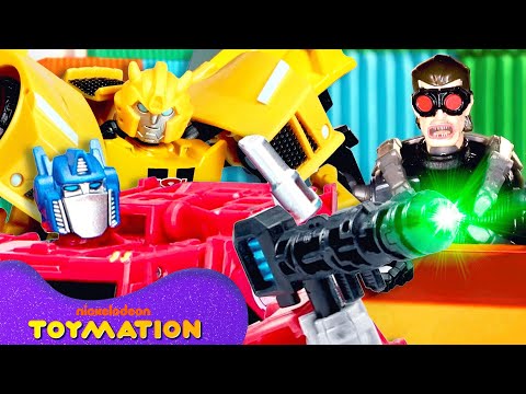 Bumblebee, Twitch, and More Transformers Bots Race Through Toy City! | Toymation