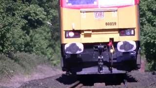 preview picture of video 'DB Shenker Class 60 diesel locomotive 60059 with loaded limestone train approaches Northenden'