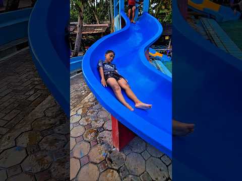 Fais playing on the slide