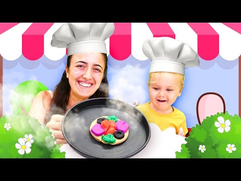 Kinder Show Mutter-Tochter-Café. Wir machen eine Pizza. Video für Kinder