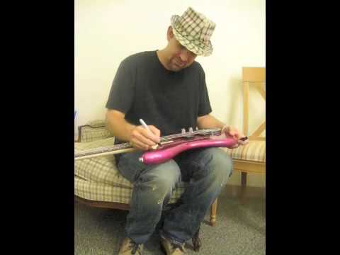 Kristian Bush of Sugarland signs bass (for charity auction)