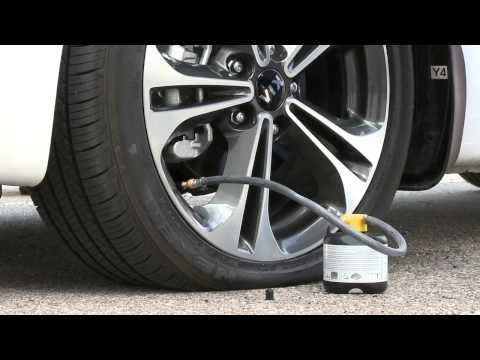 Part of a video titled Kia Tire Mobility Kit Guide - YouTube