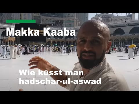 Wie küsst man  hadschar-ul-aswad der  schwarze Stein aus dem Paradiese  in Mekka Kaaba Islam