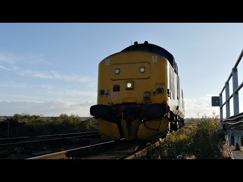 DRS 37425 & 37405 storm over Reedham Swing Bridge - 2J83