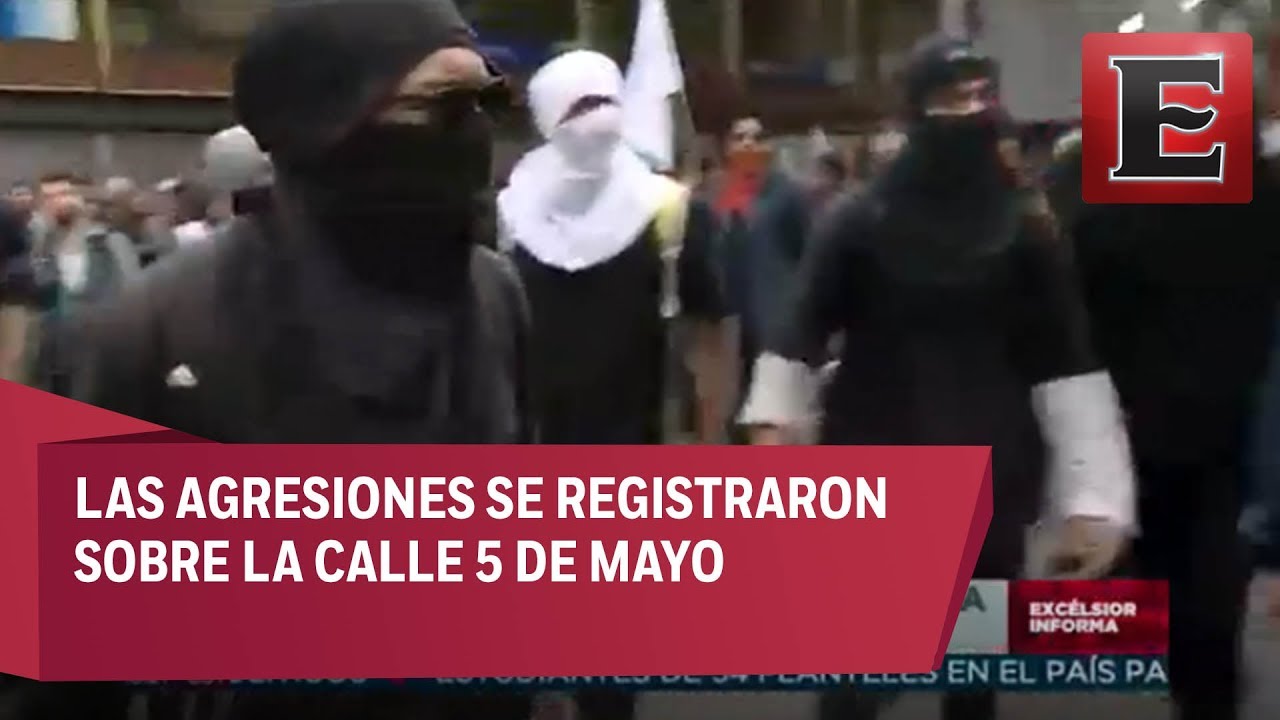 Encapuchados agreden a reportero y camarógrafo durante marcha del 2 de octubre