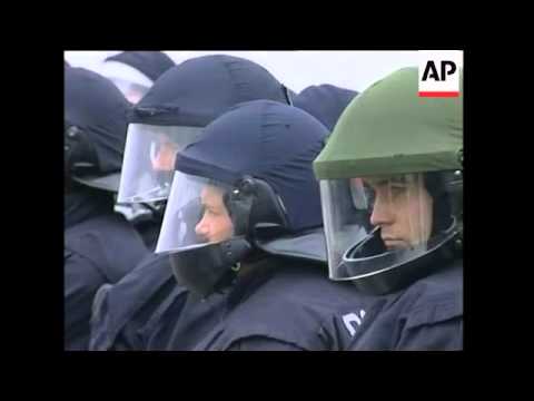 Air raid protest, rally, flags burned, clown demo