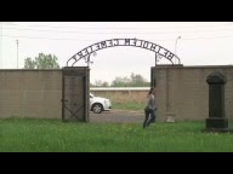 An historic Jewish cemetery surrounded by a Detroit automotive plant opens _ but only briefly _ to v