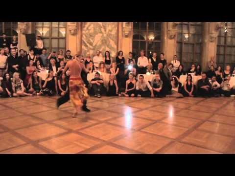  Aoniken Quiroga  and  Alejandra Mantinan  are  dancing  to  the  tango  "  Lagrimas de sangre  "  by  Osvaldo Pugliese  at  TangoAmadeus  in  2012