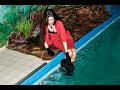 Business Lady In Expensive Wet Clothes Poses Brightly In A Swimming Pool For Wetlook Video