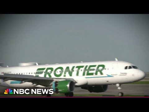 Plane has close call with trucks at LAX