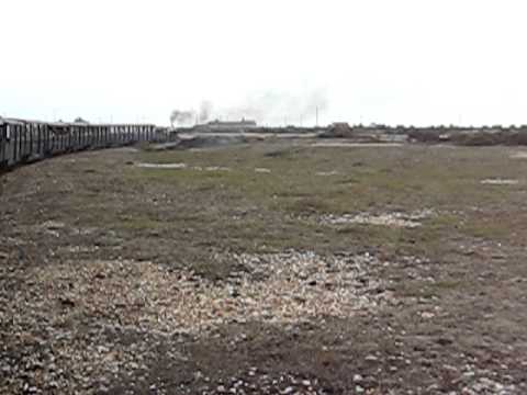 Romney Hythe & Dymchurch railway Leaving Dungeness picking up speed