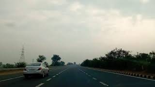 preview picture of video '#yamunaexpressway #agra #roadtrip #clouds Beautiful road trip at yamuna express way'