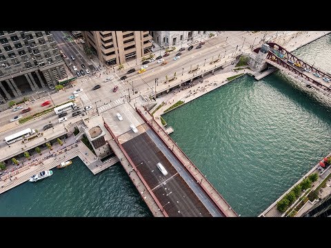 Drone footage tours bustling promenade on Chicago's riverfront