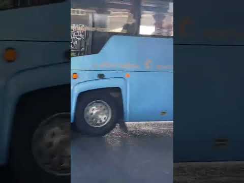 Suba na garupa de uma moto, Taxi Bangkok, Tailândia