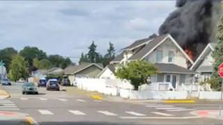 Neighbor rushes to help during fire