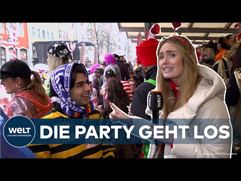 KARNEVAL IN KÖLN: Wolkenbrüche und Terrorgefahr - Doch die Jecken lassen sich nicht verschrecken