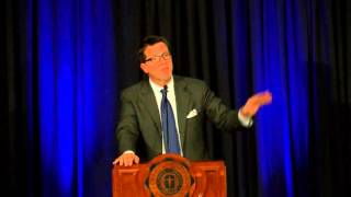 Dr. Peter J. Williams on stage giving his talk, Does the Bible Support Slavery?