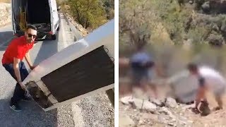 video: Spanish police force man who threw refrigerator off cliff to drag it back up again