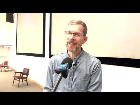 University science professor keeps students engaged through singing