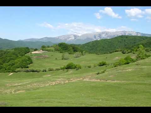 Panorama Muntilor Capatanii admirati din satul Tisa