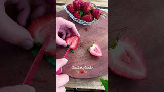 How to cut strawberry hearts🥰 🍓 #strawberry #fruitlover #fruitcutting #yum #foodie #fruitart #easy