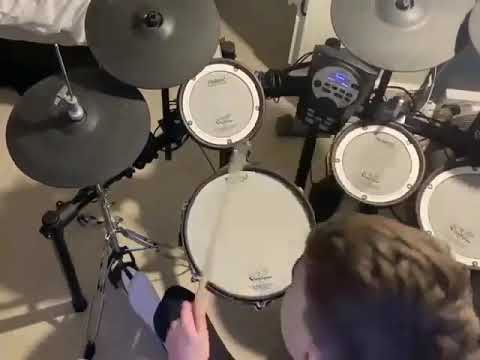 Freddie playing along to 'Death On Two Legs' by Queen