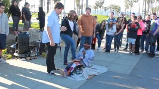 Crazy Guy Sits In Glass!!!