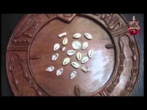 The secret of the Ifá divination system (cowrie shells and Odu)